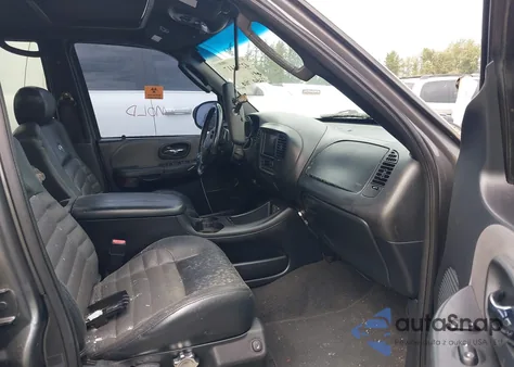 2002 Ford F-150 Lariat из США, поврежденный, VIN 1FTRW073X2KE06137